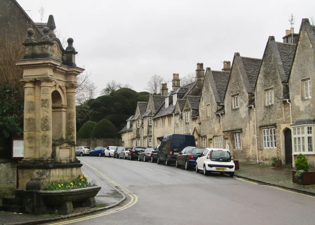 Corsham High Street lined with honey-coloured stone buildings