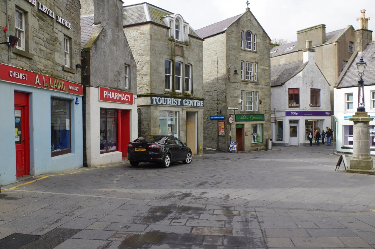 Shops and stone buildings along Commercial Street in Lerwick