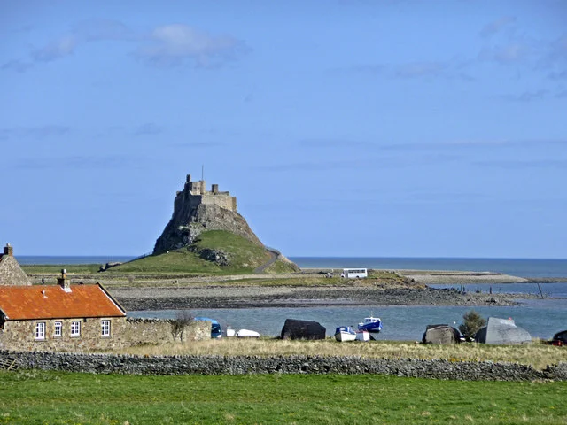 Lindisfarne harbour with its castle beyond the water